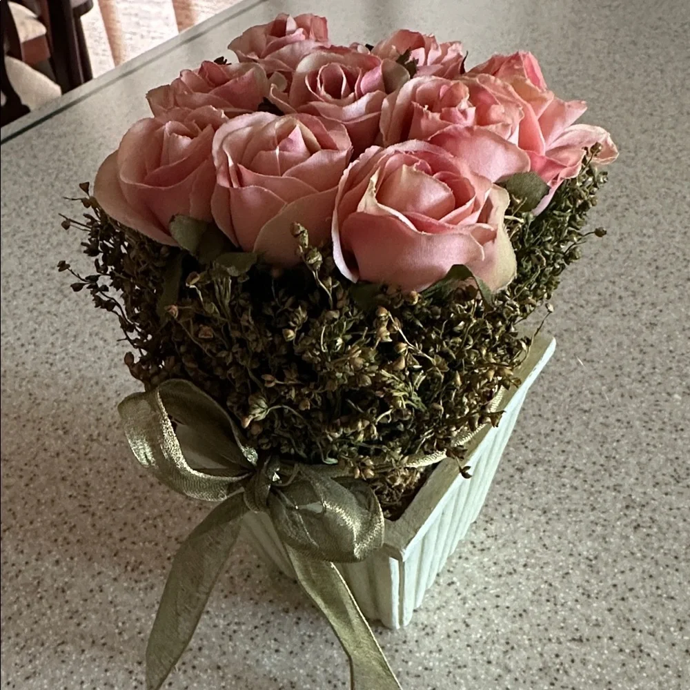 Decorative Floral Arrangement Pink Roses in a green planter box